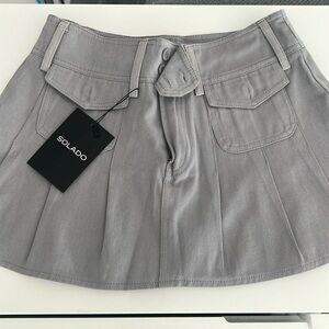 NWT grey micro mini skirt. Two button and zip fly. School girl skirt.